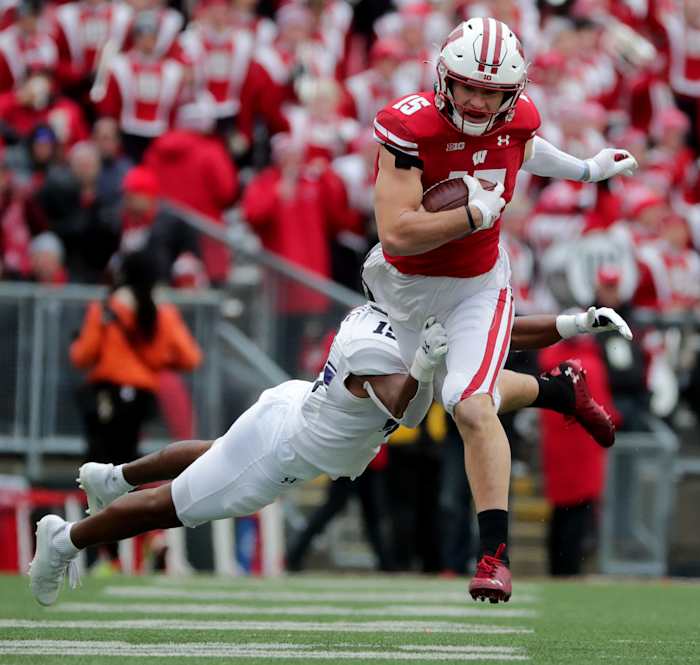 Wisconsin safety John Torchio returning an interception against Northwestern.